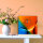 Tischuhr 30cmx30cm inkl. Alu-Ständer -abstraktes zeitloses Design orange blau geräuschloses Quarzuhrwerk -Kaminuhr-Standuhr TU3074 DIXTIME